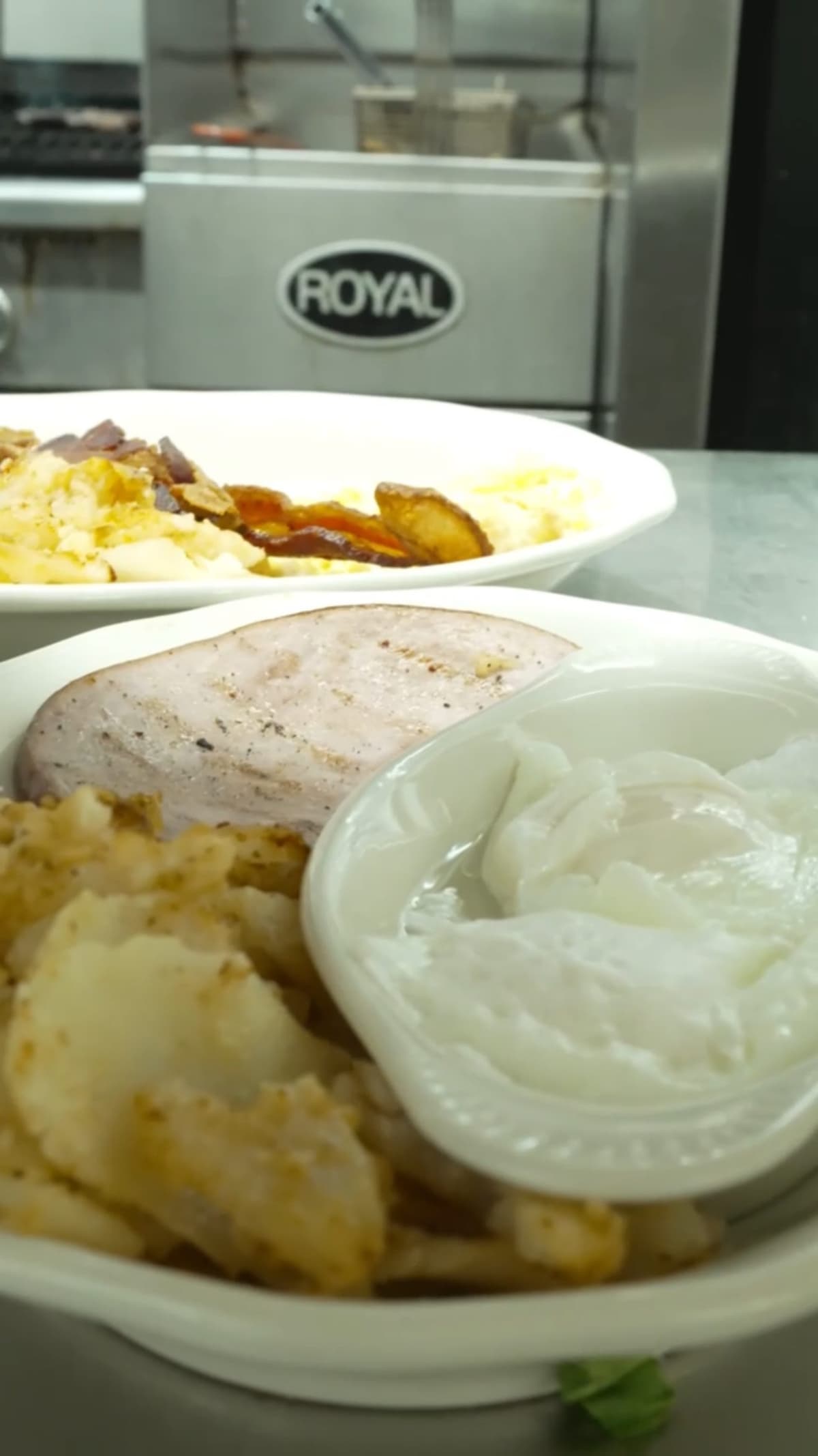 Breakfast plate with home fries and eggs