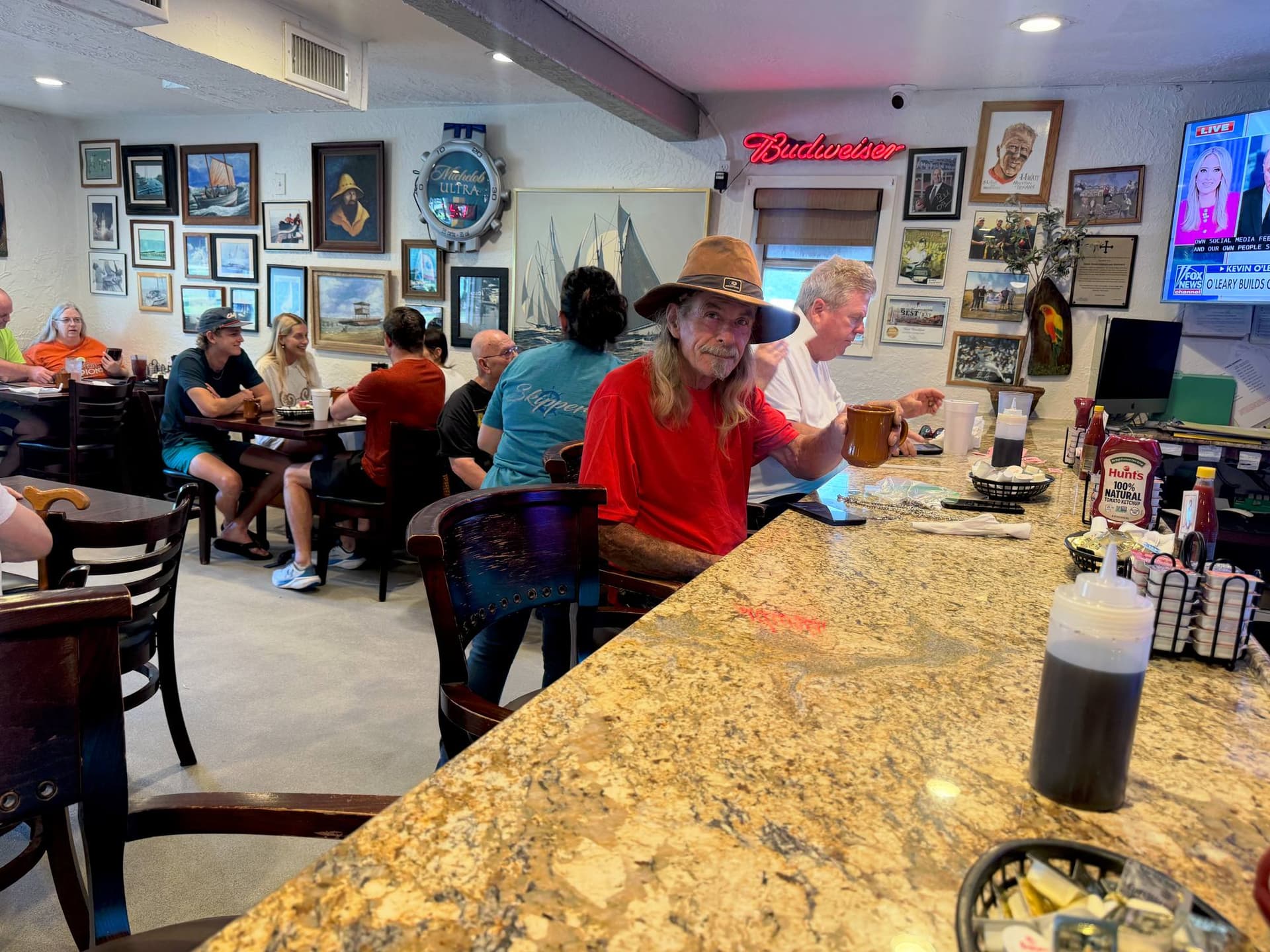 Regulars at the counter at Skipper's Cafe